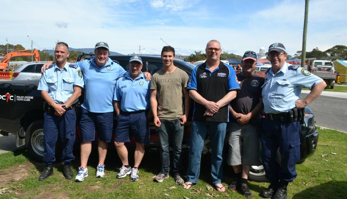 PCYC CREW: Police officers Scott Wharfe, Far South Coast PCYC youth case managers Greg Curry and John Smith, upcoming new boxing protégée Sholto Hosking, boxing trainer Mark “Ziggy” Zielinski, Steve “Spearsy” Spears and Sergeant Steve Mawson. 