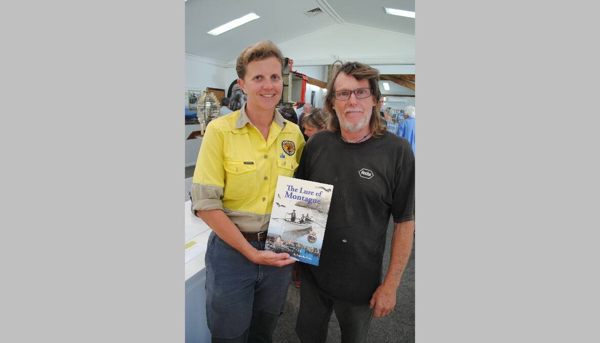 MONTAGUE MAYOR: National Parks and Wildlife Service officer Helen Hayward with the ‘mayor’ of Montague Island Boyd Hastings. 