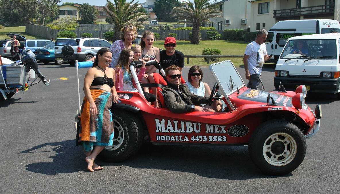 HOCKEY FAMILY: Pictured in the Malibu Mex beach buggy are the Hockey family – front Joshua Hockey with his girlfriend Hannah Mulcahy, back from left are Sarah Hockey and her daughters Sammy, Jenna and Courtney, brother Aaron and Ian’s friend of 40 years his former wife and mother of his children, Annette Hockey. 