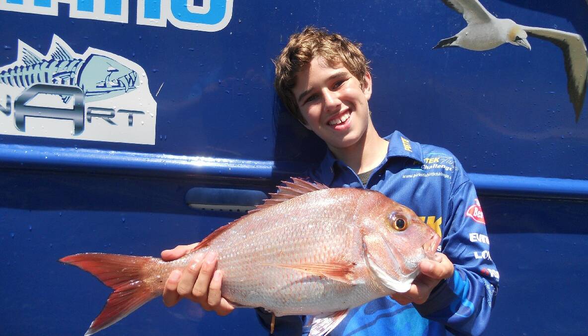 PB SNAPPER: Isaak Miller of Tahmoor with a personal best snapper caught with Narooma Fishing Charters on the weekend. 