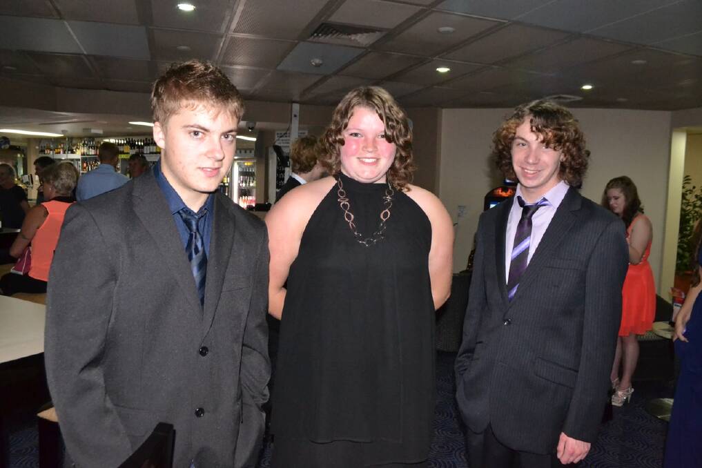 HANGING OUT: At the Narooma High School Year 12 formal are Hugo Hosking, Taylor Richards and Nick Yapp.