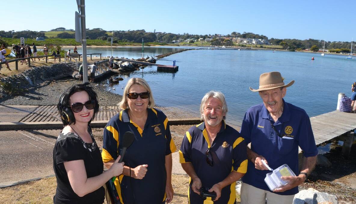 ABC INTERVIEW: Ginger Gorman from 666 ABC radio in Canberra interviews Charmaine White, Bob Antill and Jack Whiting from Narooma Rotary after the duck race. Ginger, whose mum Pat lives in Narooma, could not help working on her weekend off. 