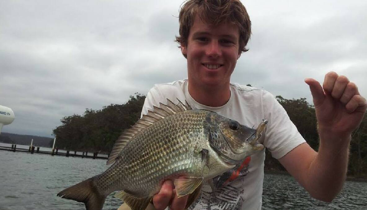  AT IT AGAIN: Fishing duo Alex Krantz, pictured with a bream, and Nick Cowley were at it again getting nice bream and flathead on plastics and poppers on the Wagonga Inlet flats this week. 