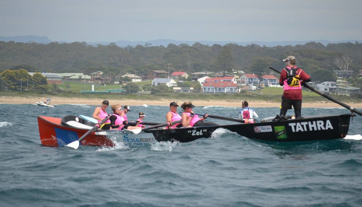 The Tathra women, who yesterday won the club's first ever race,  row to the finish at Bermagui in Day 4 of the 2013/2014 George Bass Surfboat Marathon.