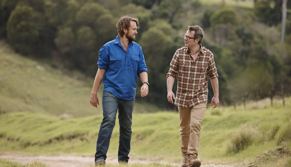 AT TILBA: New host Paul West and sustainability champion Hugh Fearnley-Whittingstall go for a stroll on the River Cottage property. 