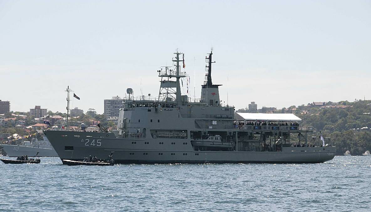 TAKING STATION: HMAS Leeuwin taking station as the Reviewing Ship with all the dignitaries on board. 