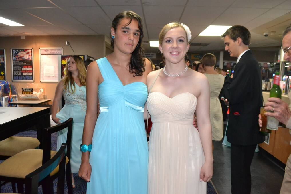 GIRLFRIENDS: At the Narooma High School Year 12 formal are Emily Meredith and Jess Richardson.