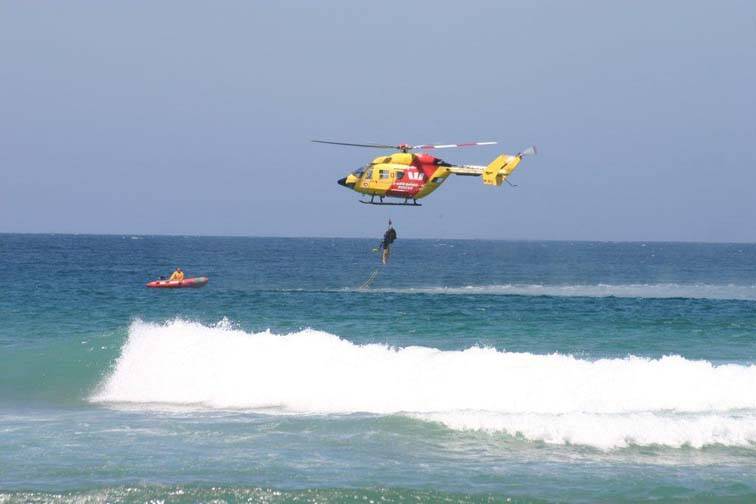WESTPAC RESCUE: The Westpac Life Saver 3 rescue chopper, pictured here conducting a rescue off Narooma beach, is not classed as a medical chopper.