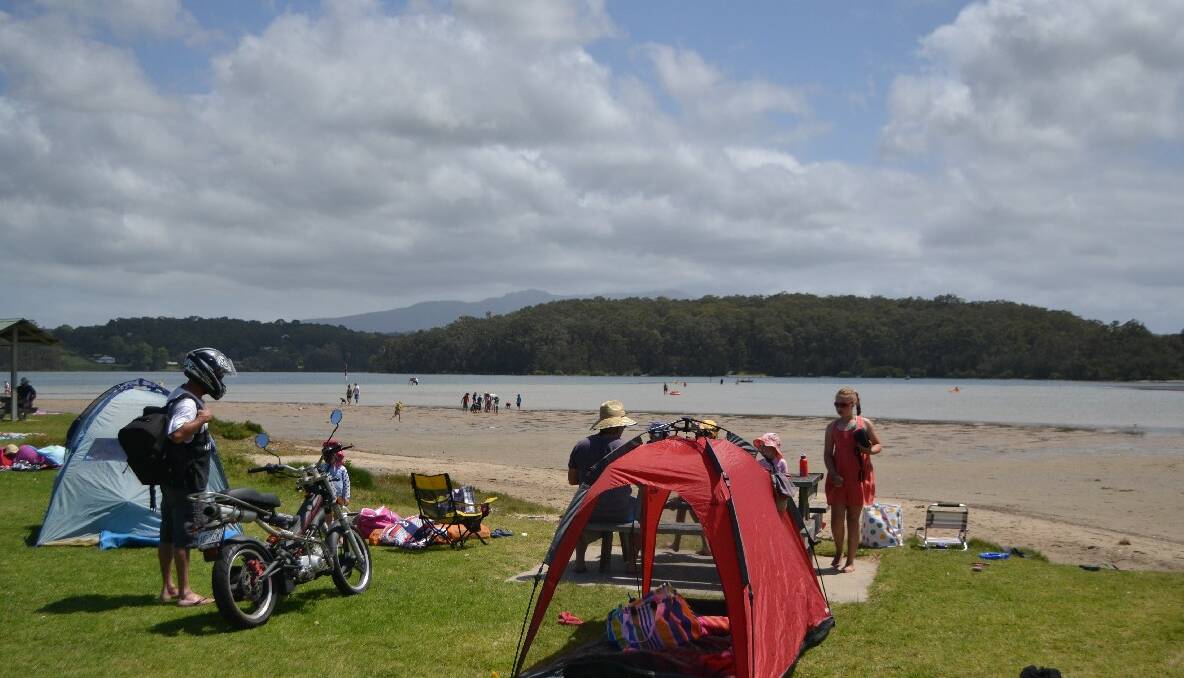 BUSY BUSY: The beach and inlet at Narooma were packed with tourists this week. 