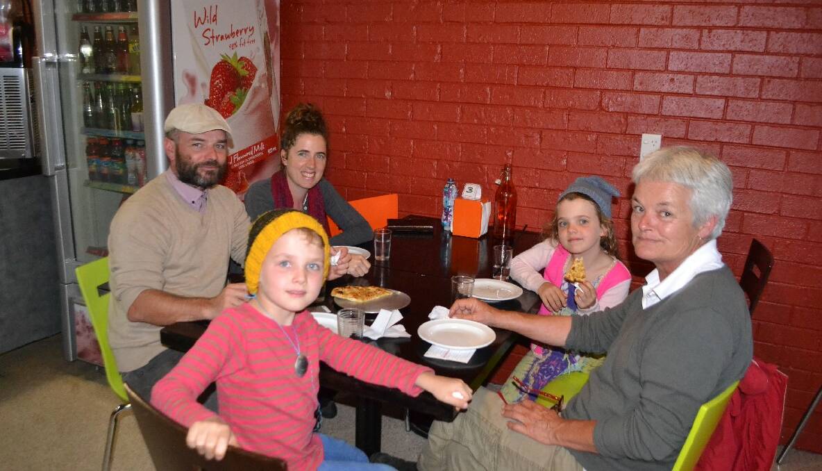 PIZZA FAMILY: At Little Joe’s wood-fired pizza before the fireworks are family Jonnie, Tamara, Jack and Ruby from Sydney with grandma Louise Brown from Cobargo.  