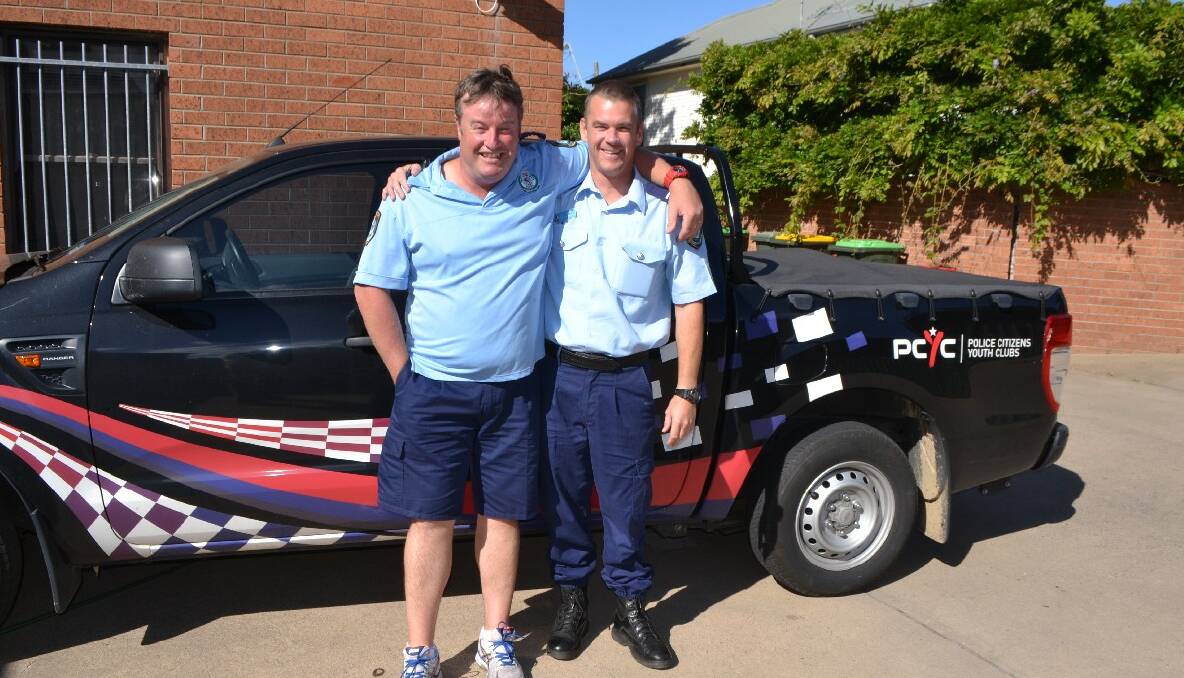 PCYC OFFICER: Eurobodalla PCYC officer Greg Curry with Narooma officer Senior Constable Scott Wharfe, who is involved with the Narooma Boxing Club. 