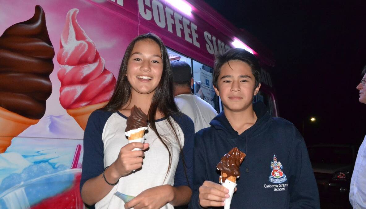   ICE CREAM TIME: Enjoying ice creams from the “Dalmeny Ice Creams a Plenty” van at the Narooma New Year’s Eve fireworks are Jasmine and Hugh Robertson from Canberra. Photo by Stan Gorton