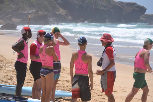 SURF ACTION: Narooma lifesaving legend Chris Young schools the young ones at the Far South Coast Life Saving Club senior carnival hosted by Narooma SLSC. Photo by Stan Gorton – Narooma News 