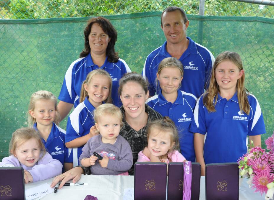 FAMILY FUN: Cobargo ASC race secretary Julie O'Meara and club president Craig O'Meara, who invited Alicia Coutts to Cobargo. They are pictured here with Alicia and their seven daughters - Sophie, Ruby, Ivy, Fiona, Evelyn, Vanessa, and Naomi. 