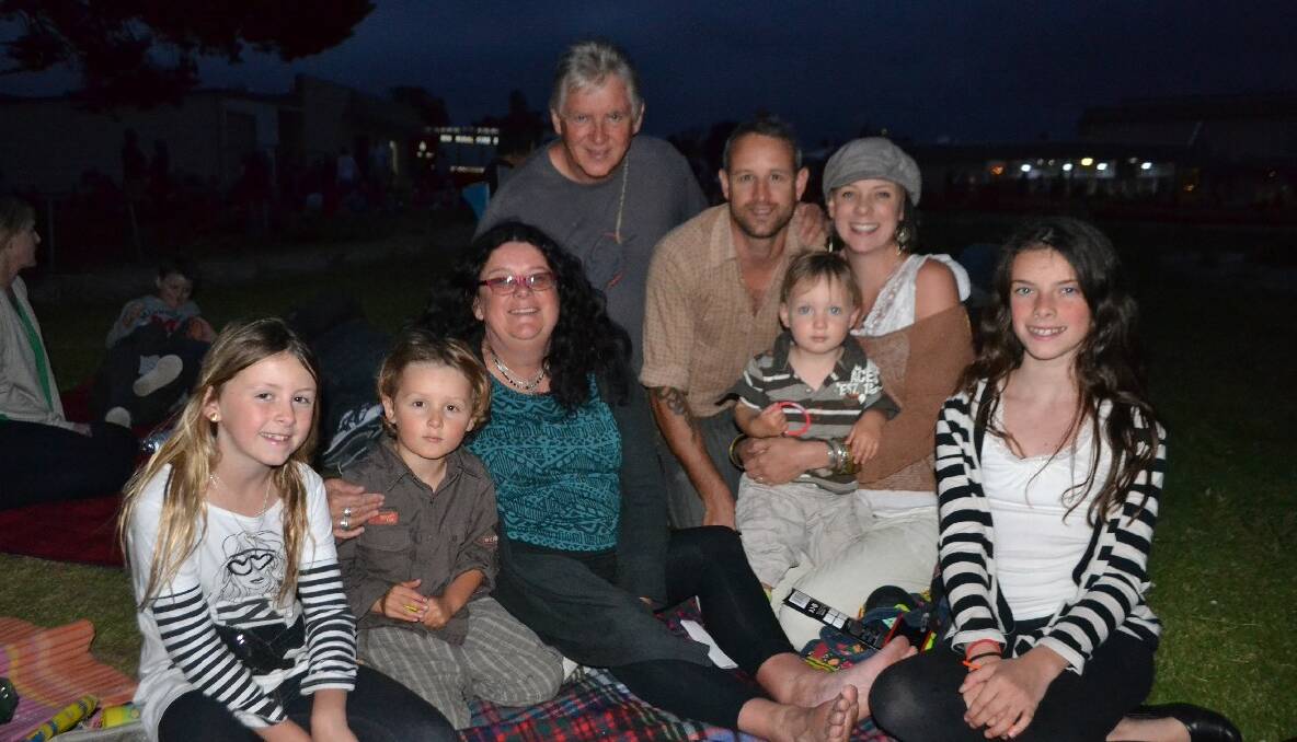   FIREWORKS FAMILY: At the Narooma New Year’s Eve fireworks at the Narooma Golf Club are Lillian, Elissa, Ben, Reuben Eastwood, Wendy and John Rawsley, Felix and Nikita Eastwood from Bodalla, Corunna and Wanaka, NZ. Photo by Stan Gorton