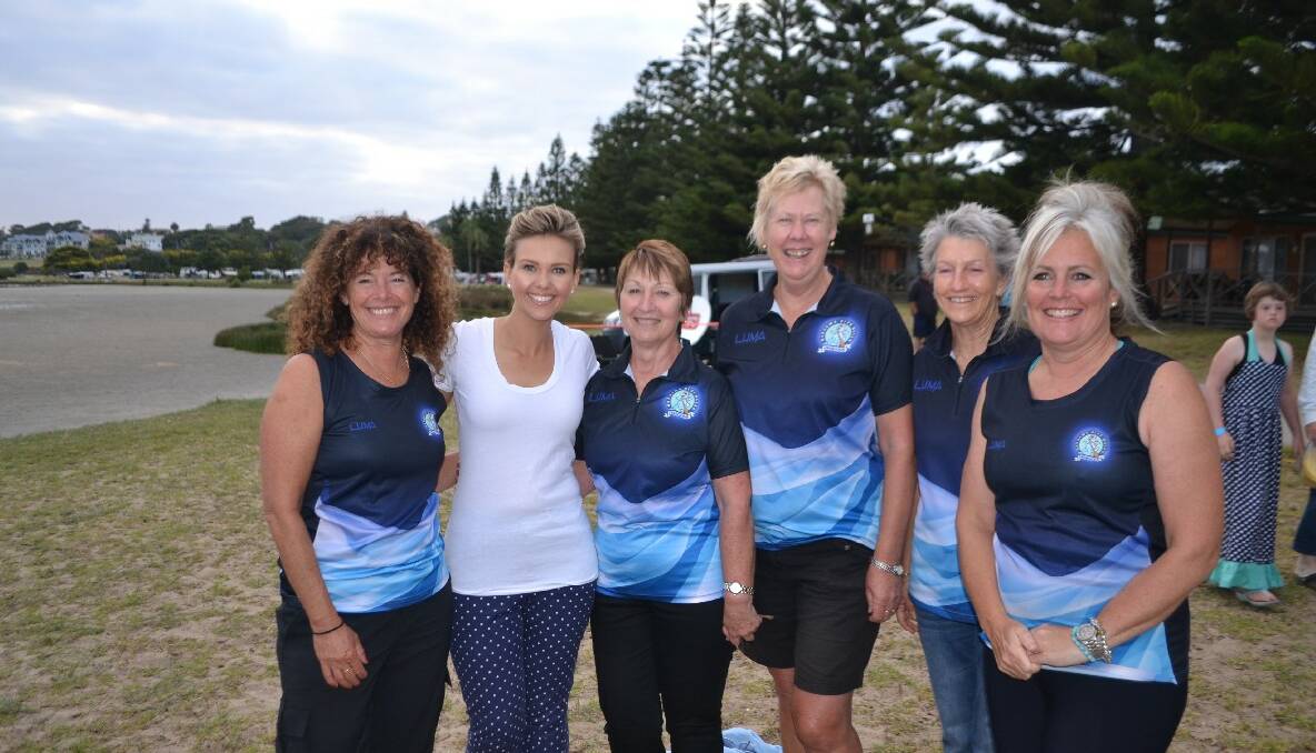 DRAGONS AND EDDIE: The Narooma Blue Water Dragon Boaters looking good in the uniforms with Eddie are Libby Shortridge, Judy McLachlan, Judy Whiting, Leck Swadling and Gilly Kearney. 