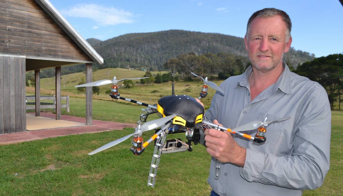 UAV PILOT: Warren Purnell from Project Vulcan Unmanned Aerial Systems and his custom built UAV or unmanned aerial vehicle, the perfect platform he says for assisting firefighters in their bushfire duties. 