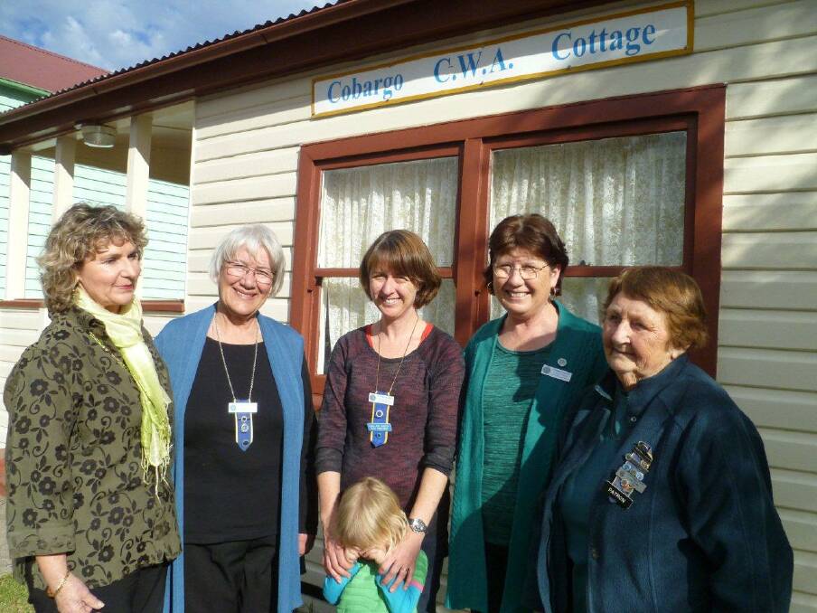 CWA STARS: Riverside Cottage CWA stars Nelleke Gorton, champion scone maker from Bega branch, and Far South Coast Group president Mary Williams and Cobargo branch members Louise Allery, Debbie Fisher and Norma Allen.