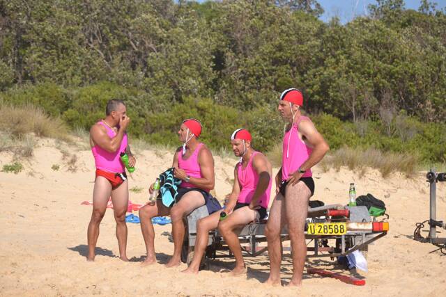 SURF ACTION: Narooma SLSC rowers take a break between races. Photo by Stan Gorton – Narooma News 