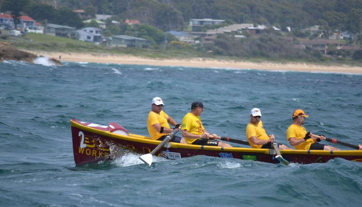 The Bulli vets  row to the finish at Bermagui in Day 4 of the 2013/2014 George Bass Surfboat Marathon.