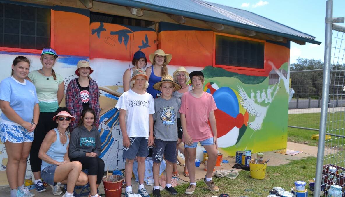 ARTISTIC FLARE: Jayden Willis, Isabella Holdsworth, Jenni Bourke, Lizzy Kamevaar, Taleha Ardler, Tommy Driscoll, Abby Stokes, Tailem Brown, Will Middlemiss, Anne Spires and Jackson Kelly were surrounded by paint tins as they painted the mural. 