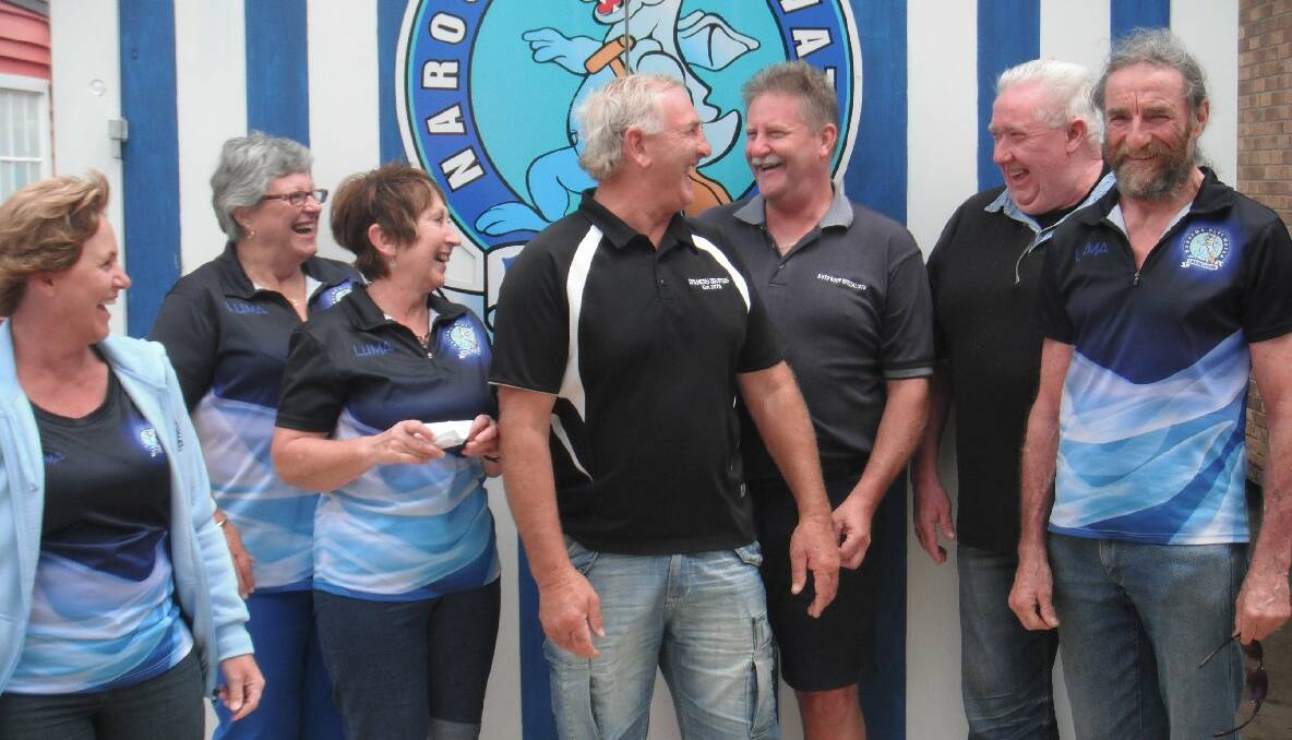 SMILES APLENTY: Sally Farrell, Helen Hayes, Leck Swadling, Norm Budin, Peter Gruber, John Rowley and Peter Essex at the presentation of a cheque from the Dalmeny Deviates to help the Narooma Blue Water Dragons. 