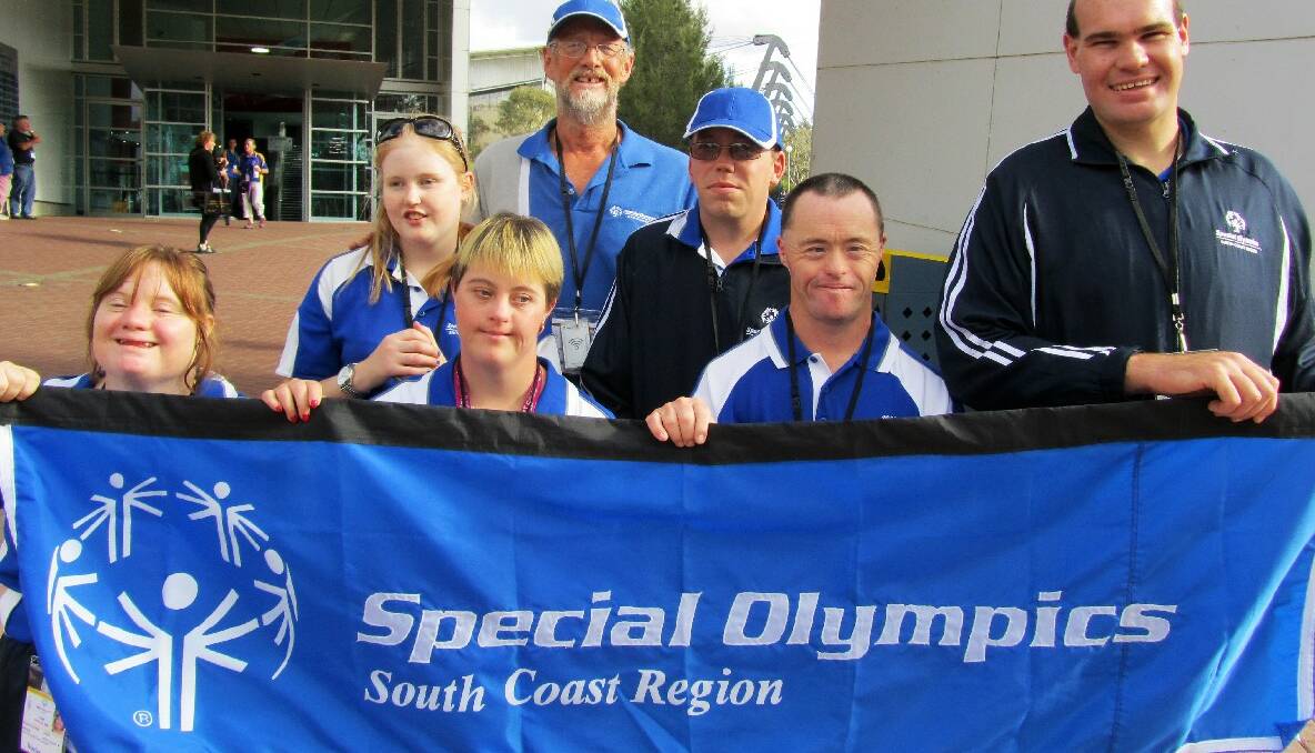 SWIM STARS: Special Olympics South Coast swim team Liz Godwin, Heidi Jay, Amy Foot, John Cowan (coach), James Gillett, Cameron Banson and Andrew Radford.
