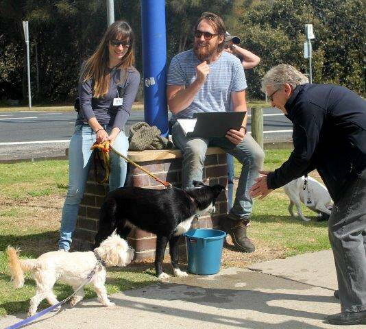Paul West and his girlfriend Alicia Cordia with Digger, and Ros Van Dam in the blue jacket.  He is judging the Happiest dog.  A very difficult task.