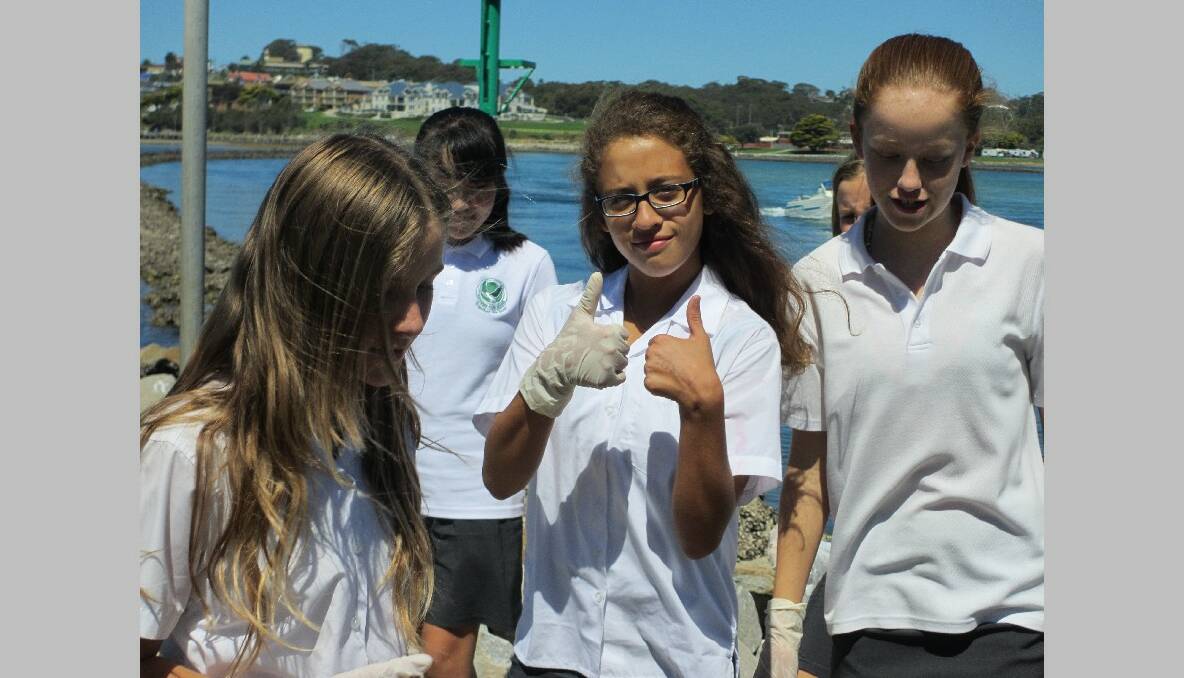 ALL GOOD: Narooma High School students Cassidy Ker, Michelle Lee, Zayla Phillips and Samantha Hearn give the thumbs up to Clean Up Australia.