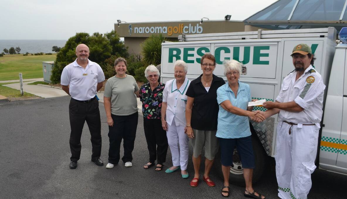TRUCK OUTFIT: Narooma Golf Club general manager Dominic Connaughton and lady golfers captain Ange McMillan, secretary Molly Worrall, president Pam Leonard, Christine Galbraith and Dierdre Landells hand over the cheque to the VRA rescue squad’s Jeff Garrad.