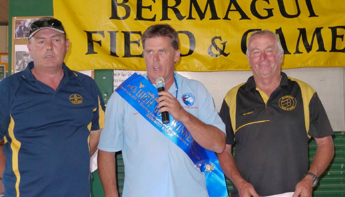 BERMAGUI FIELD AND GAME:  High Gun Mick Munro with State president Trevor Heise and club president Nev Brady.