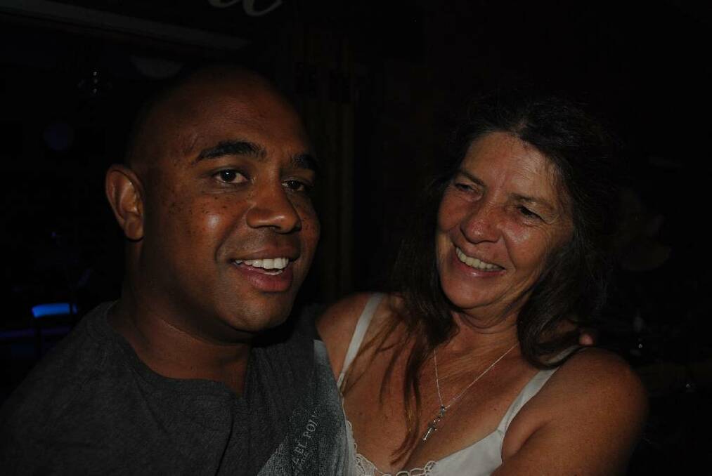 FUN: Bodalla’s Anthony Terare and Cheryl Colburn sharing a laugh on New Year’s Eve at the Bodalla Arms Hotel.