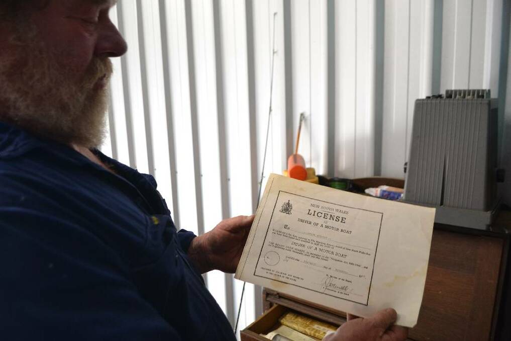 ORIGINAL TICKET: Charter skipper Keith Appleby and his original charter licence from back when he started in 1983.