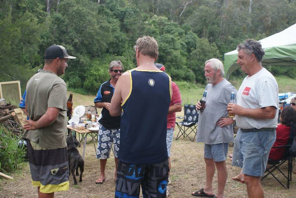 THE BOYS: Gene Willis, Chris Black, Colin from Queensland and Greg Willis and others at the campfire.