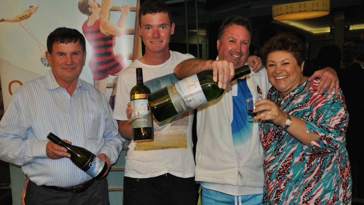 MERIMBULA: Ron Molloy, left, Dylan Cuthbert, Wayne Thomas ‘Squizzy’ Taylor and Kim Hammond were among wine lovers to open their   wallets for a Cystic Fibrosis fundraiser