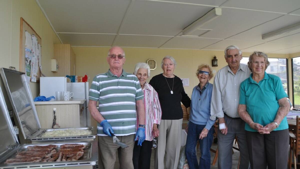 The barbecue was in full swing at Bimbimbie Retirement Village, Merimbula with Neville Currie, left, Mavis Kimber, Eileen Bruce, Nancy Cox, Stan Cox and Nell Harris.