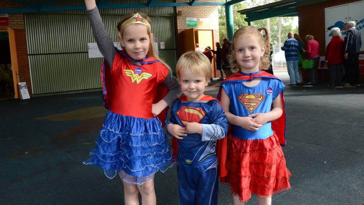 Even little superheroes Ellie, Jasper and Kahlei Hopkins of Broulee could not predict who would win the bellwether seat of Eden-Monaro on polling day.