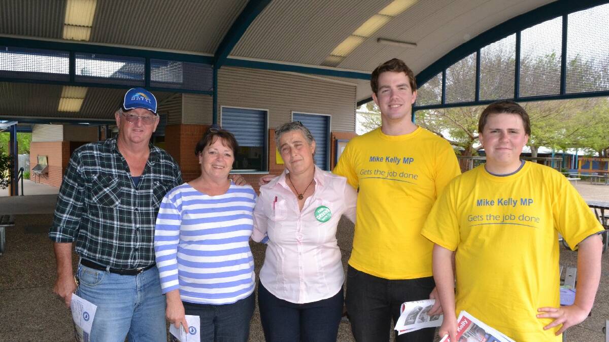  Handing out voting information at Bodalla Public School on Election Day from left Ken and Leanne Dawson, Nan Morton, Michael Hiscox and Jack Gracie.