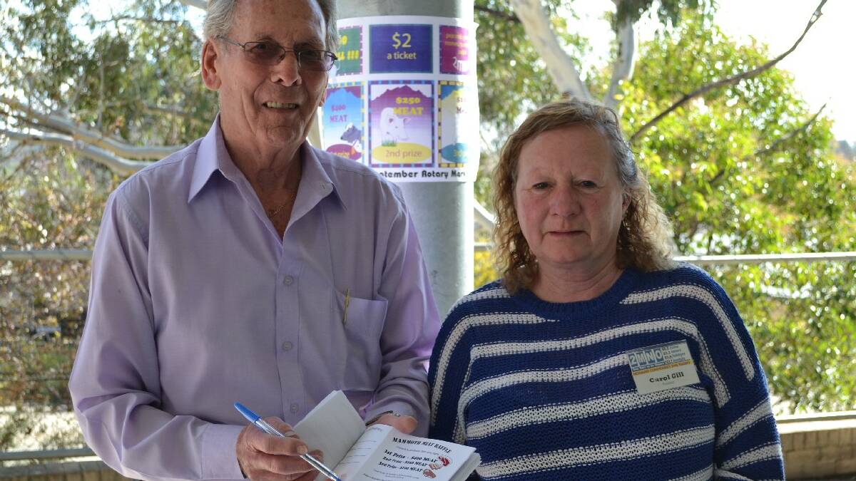 President of Monaro Community Radio 2MNO John Gill and wife Carol took time off from being behind the microphone to fundraise at the Cooma Public School polling station.