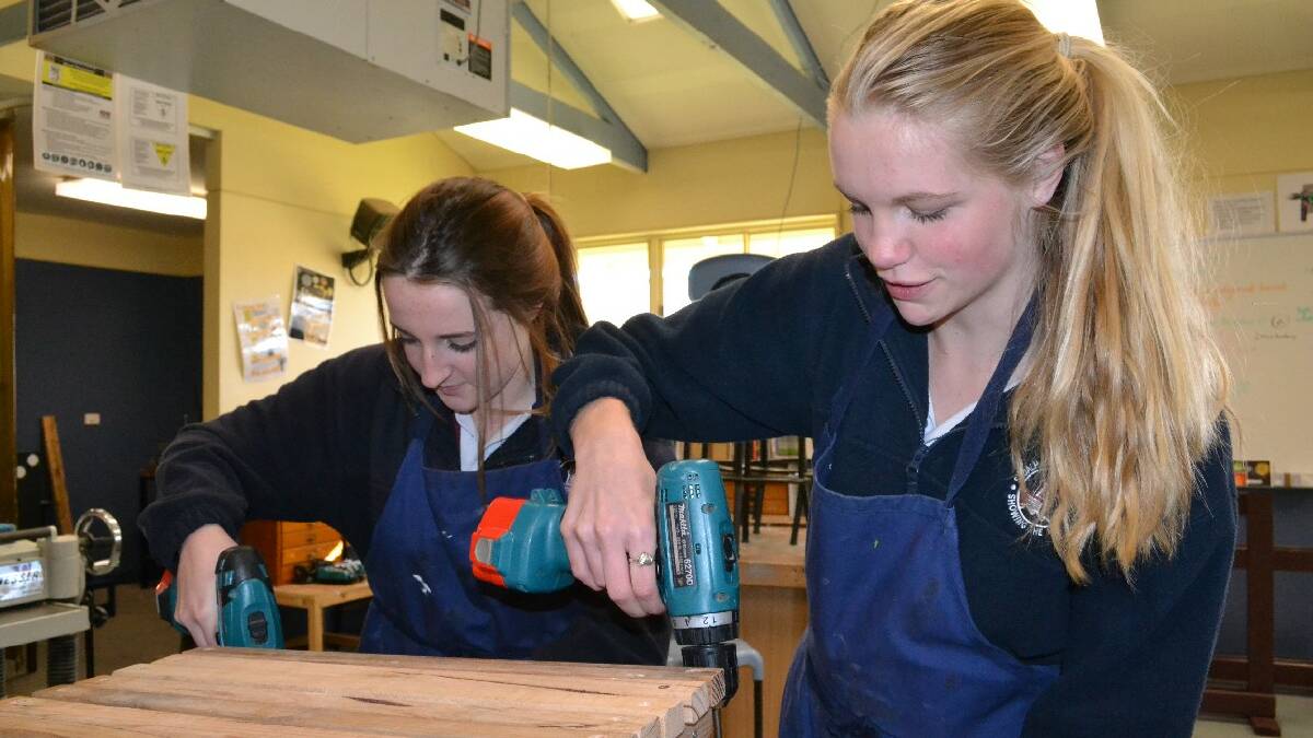 ULLADULLA: Lauren Harvey and Chloe Tasker work in Shoalhaven Anglican School’s trades training rooms that are about to be   refurbished to establish a trades training centre.