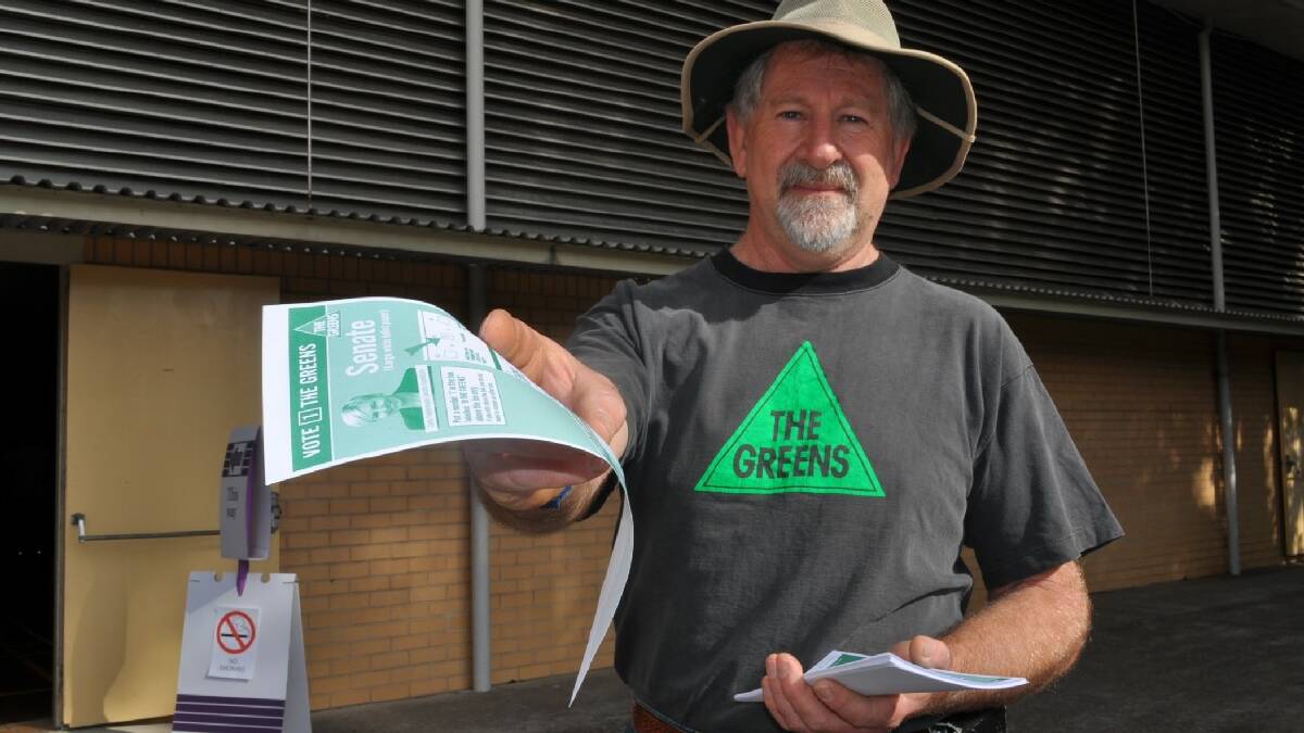 Will Douglas was handing out how to vote cards for the Greens at Batemans Bay High School. 