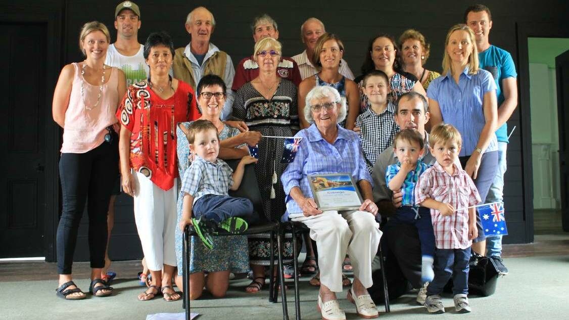  May Blacka (centre, front) captured in 2016 with her family, in receiving Cobargo Community Citizen of the Year. 