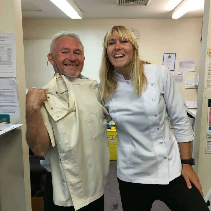 Family steps: Freya Prumm at work at Prumm's Family Chemist with proud dad Dean. Photo supplied