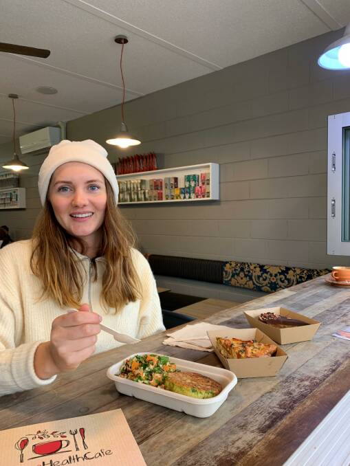 Julia Howlett makes use of Moruya Health Food Cafés eco-friendly packaging. Photo: Supplied 