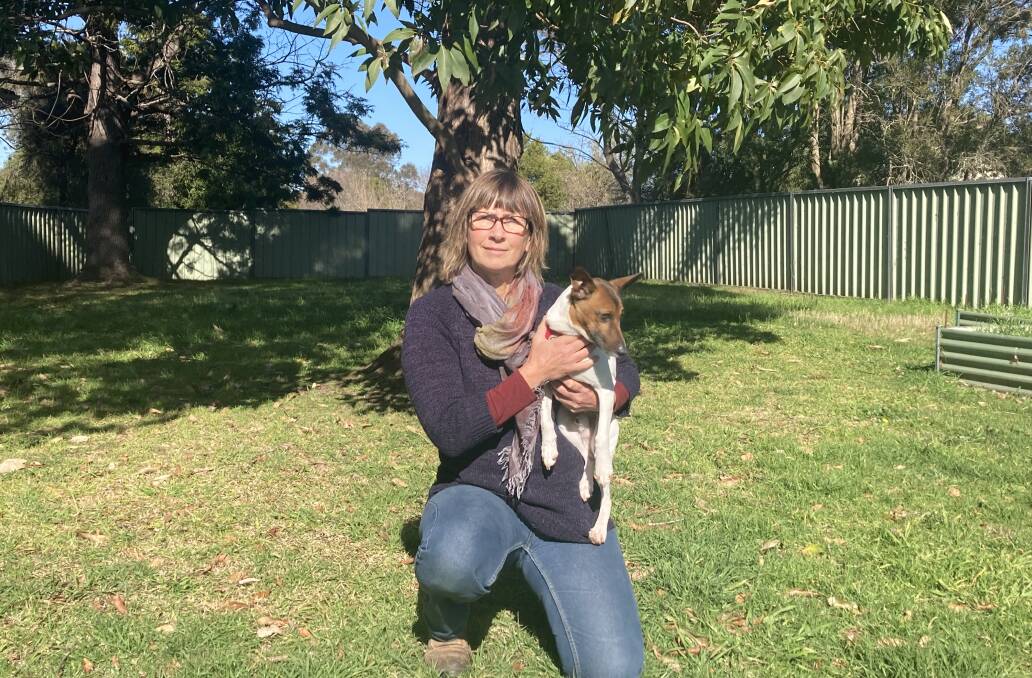 Kate Raymond with her rescue dog Frank. Frank was rushed to the vet earlier this month after eating rat poison strung on a piece of wire.