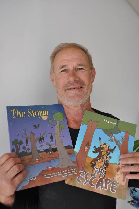 Author Ben Innes, or I.B. Gumnut, with two of his published books.