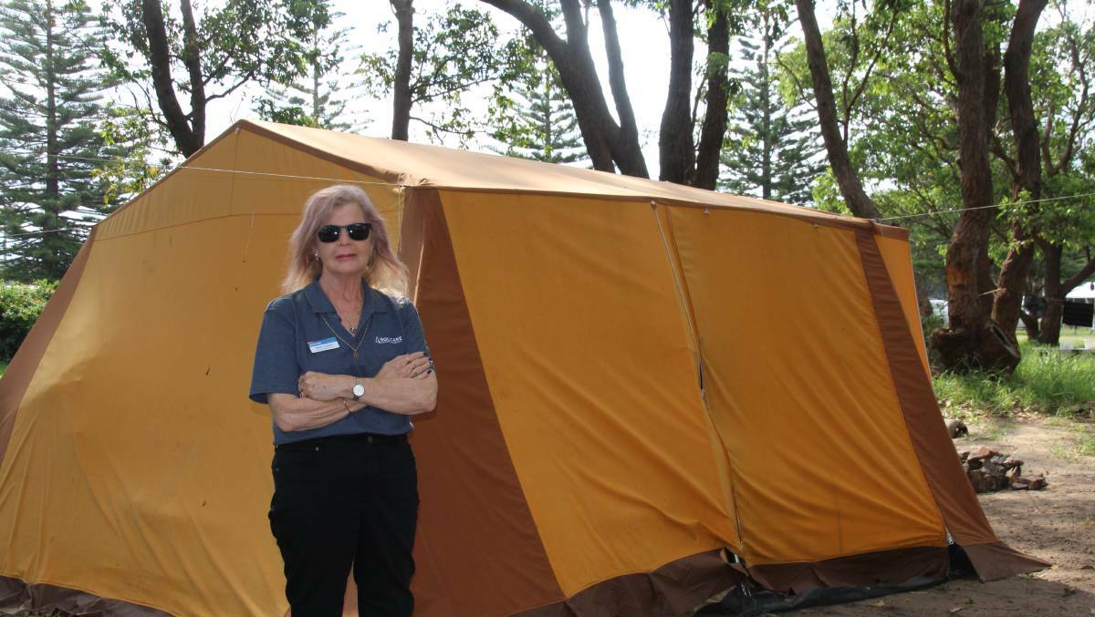 Anglicare's Emergency Relief Coordinator Pauline Sullivan stands in front of the tent of one of her clients near the Moruya Airport. File picture.