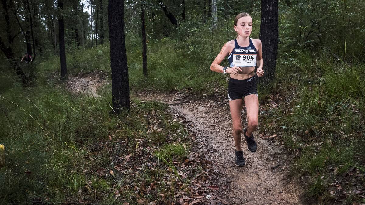 Moruya's 12-year-old running sensation Taylor Traecey running the Mogo course.
Photograph: Rocky Trails