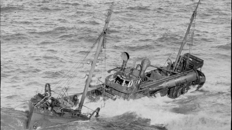 Dureenbee with her funnel blown off, aground on the Richmond bombora north of Batemans Bay. Picture: Maritime Museum.