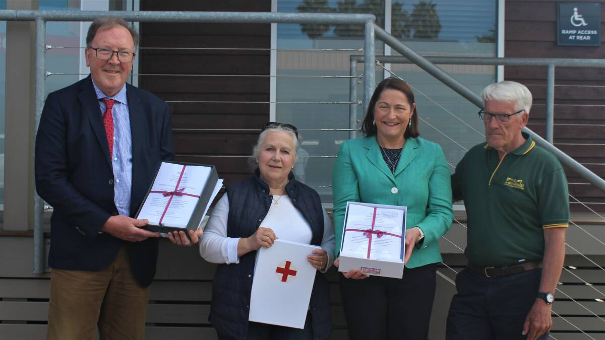 The petition calling for radiotherapy was presented to local MPs in Moruya. From left to right: Bega MP Dr Michael Holland, One New Eurobodalla's Mylène Boulting, Gilmore MP Fiona Phillips and Can Assist Bega's Peter Van Beracht.